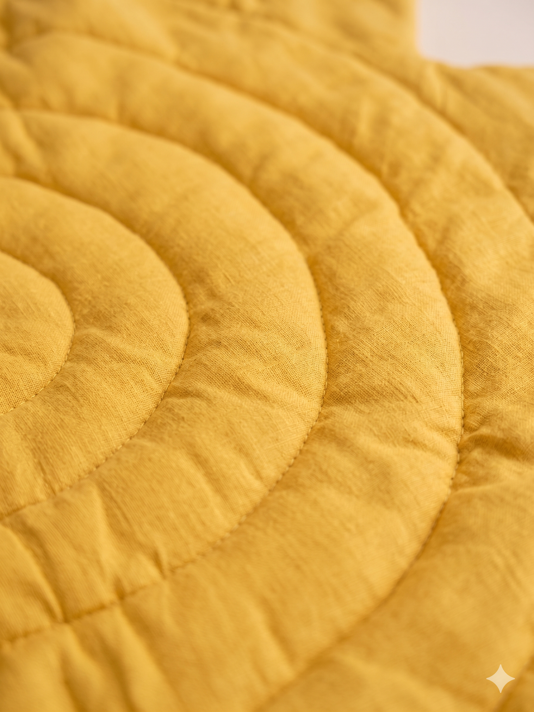 Handmade linen play mat detail, natural texture, Scandinavian baby room decor"