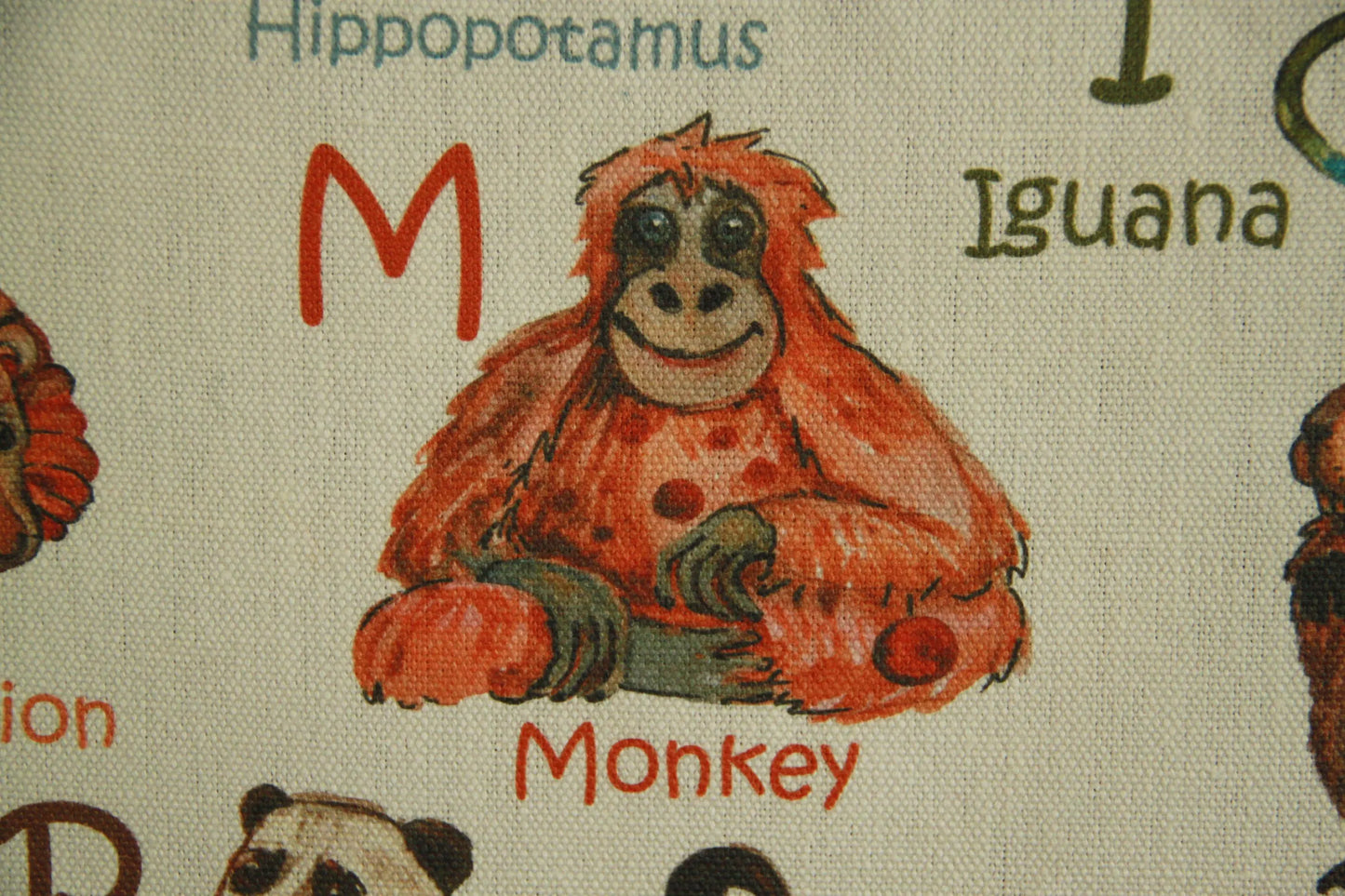 Linen wall banner close-up, alphabet with animals, Scandinavian children's room"